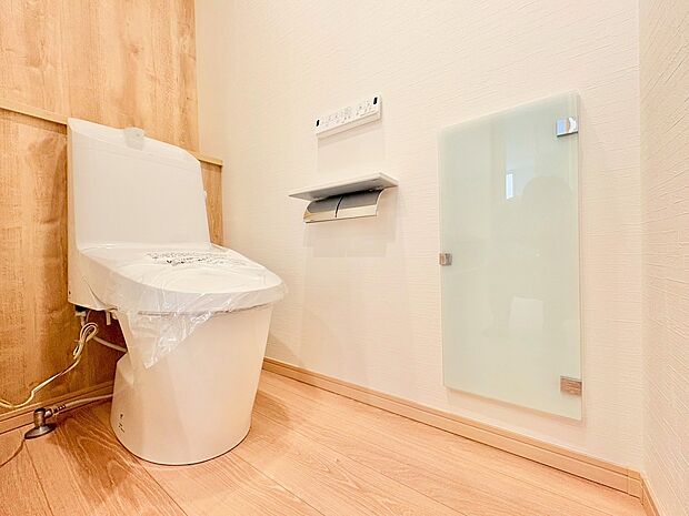 クロスと床の組み合わせがお洒落なトイレスペース。