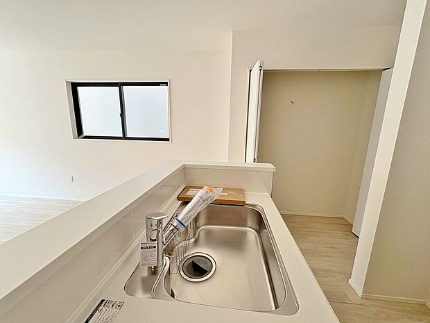 会話の弾むキッチンは自然とご家族の中心に。