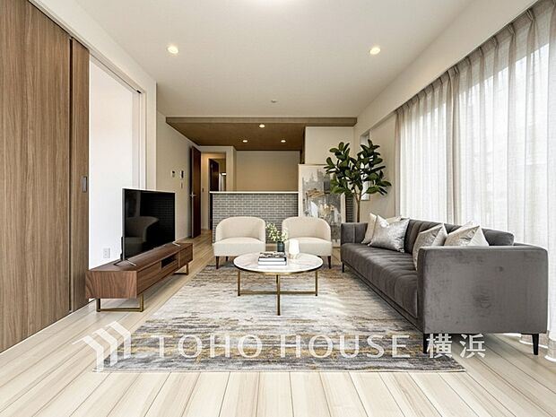 寛ぎとコミュニケーションを育む居心地のよい場所。（家具・装飾品はAI加工です）