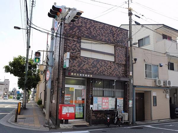 西成北津守郵便局まで79m