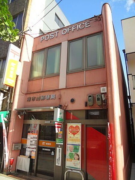 港市岡郵便局まで449m