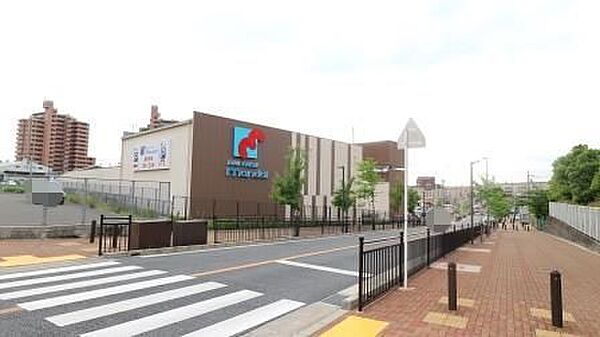 万代寝屋川宇谷店まで1240m
