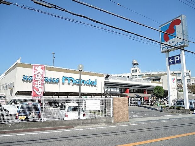 万代堺土師店まで1100m