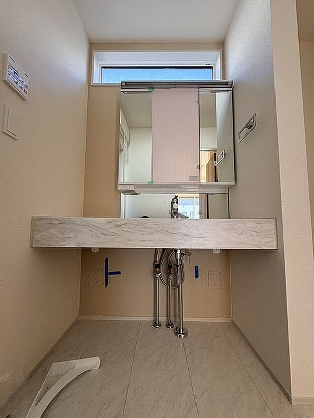 使いやすいタイプの洗面化粧台のあるランドリースペース