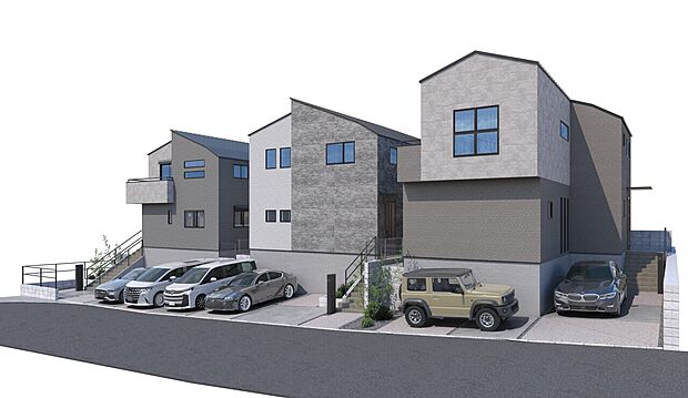複数棟の建物と駐車スペースを備えた外観