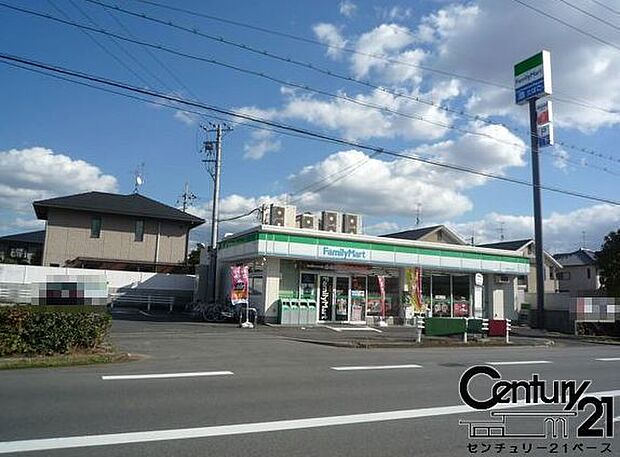 ファミリーマート上牧桜ヶ丘店まで293m