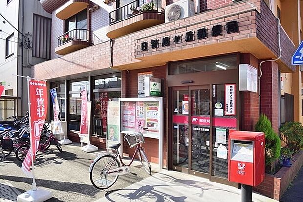 日野旭が丘郵便局まで646m