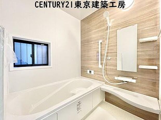 【施工例写真】癒しの空間バスルームです。天気に左右されずに洗濯物を乾かせる、浴室乾燥機付きです。