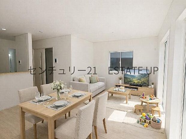 【リビング】リビング空間にキッチンがあり、みんなで食事を楽しめる空間。※ホームステージングしているイメージ図です。