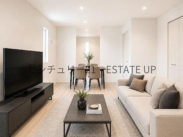 【リビング】リビングの奥にキッチンがあり、みんなで食事を楽しめる空間。※ホームステージングしているイメージ図です。