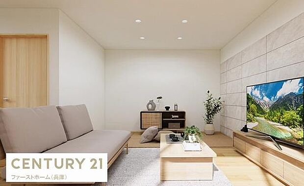 ナチュラルな色合いで統一されたリビングはシンプルで飽きのこないデザインです。壁面のアクセントが空間に奥行きをもたらします。収納スペースも充実しておりすっきりとした印象です。