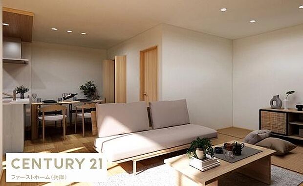 落ち着いた色合いのリビングはどなたにもなじみやすい雰囲気です。温かみのある照明やナチュラルな家具が空間をやさしくまとめています。広がりのある設計が毎日の生活をサポートします。