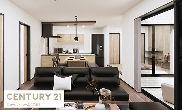 シンプルで落ち着いた色合いのリビングです。大きな窓があり採光がしっかり確保されています。リビングからキッチンへの動線も分かりやすい配置です。家具の配置がしやすい間取りとなっています。