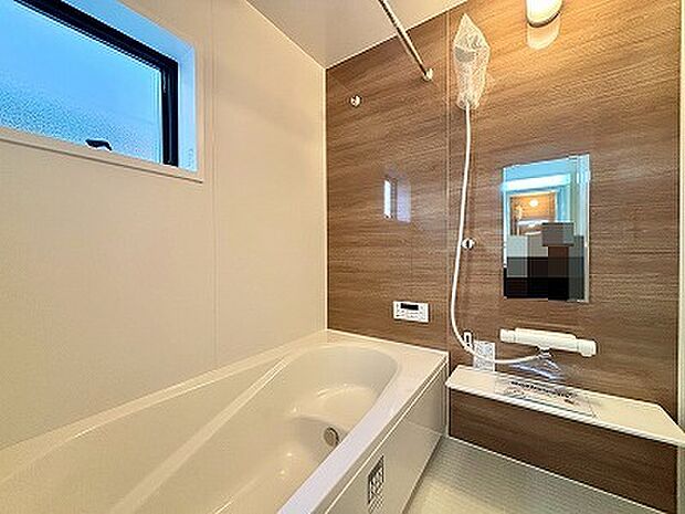 一緒にお風呂に入っている子供達の声がリビングまで聞こえてきそうな広々とした1坪バス 