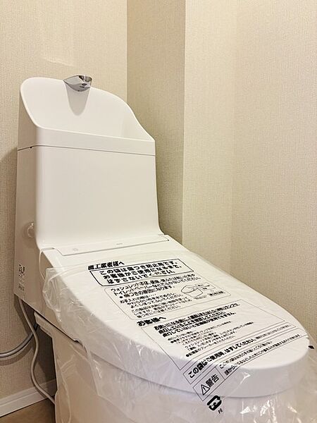 ウォシュレット機能付きのトイレ。