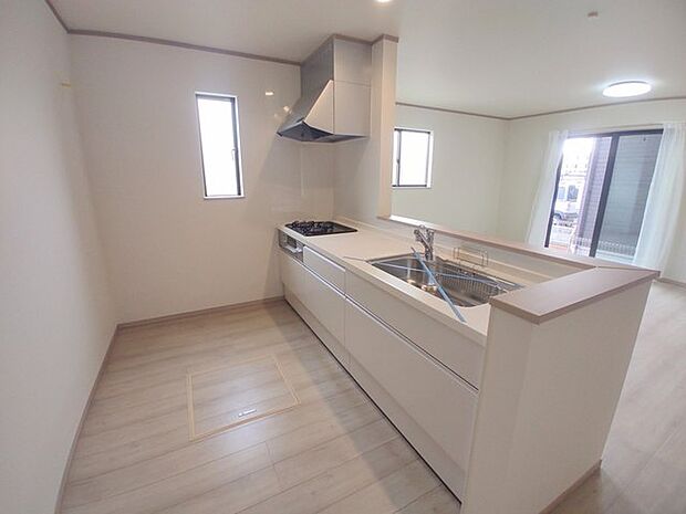 料理をしながらでも、ご家族との会話を楽しめる対面キッチン。