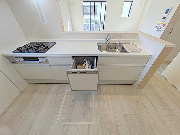 料理をしながらでも、ご家族との会話を楽しめる対面キッチン。 