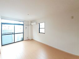 コスモミレニアム 205 2階1LDKのリビング/ダイニング