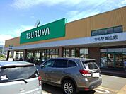 【スーパー】ツルヤ飯山店まで1900ｍ