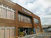 TSUTAYAいまじん白揚春店まで950ｍ