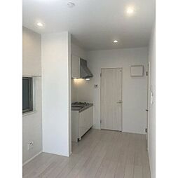 カーサルピナスティーアール 101 1階ワンルームのリビング/ダイニング