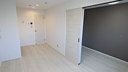 カインドネス八王子元本郷 303 3階1LDKのリビング/ダイニング