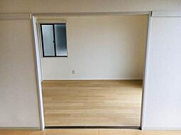 ポアソン日出　Ａ棟 A0101 1階2Kのリビング/ダイニング