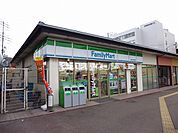 【コンビニエンスストア】ファミリーマート 近鉄東生駒駅前店まで257ｍ