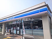 【コンビニエンスストア】ローソン生駒小平尾町店まで710ｍ