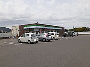 【コンビニエンスストア】ファミリーマート 西条国安店まで658ｍ
