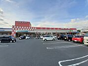 【スーパー】マルイイーストランド店まで615ｍ