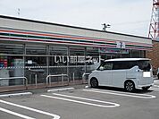 【コンビニエンスストア】セブンイレブン　高鍋郵便局前店まで966ｍ