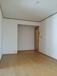 スイートとまと三番館 101 1階2LDKのリビング/ダイニング