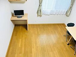 レオネクストサーフサイド海誠 1階1Kのリビング/ダイニング