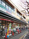 【スーパー】コモディイイダ食彩館桜川店まで537ｍ