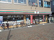 【コンビニエンスストア】セブンイレブン越谷大袋駅西口店まで396ｍ
