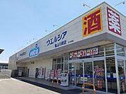 【ドラッグストア】ウェルシア亀山川崎町店まで1800ｍ