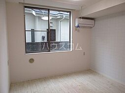 キングスコートII 105 1階ワンルームのリビング/ダイニング