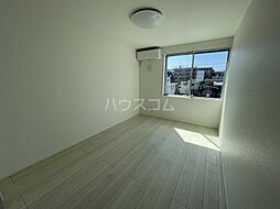 カインドネス八王子元横山町 202 2階1LDKのリビング/ダイニング