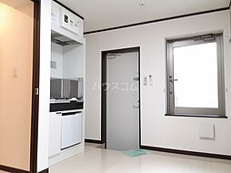 イルビラージュ王子 1階ワンルームのリビング/ダイニング