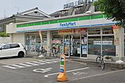【コンビニエンスストア】ファミリーマートかどの七条店まで392ｍ